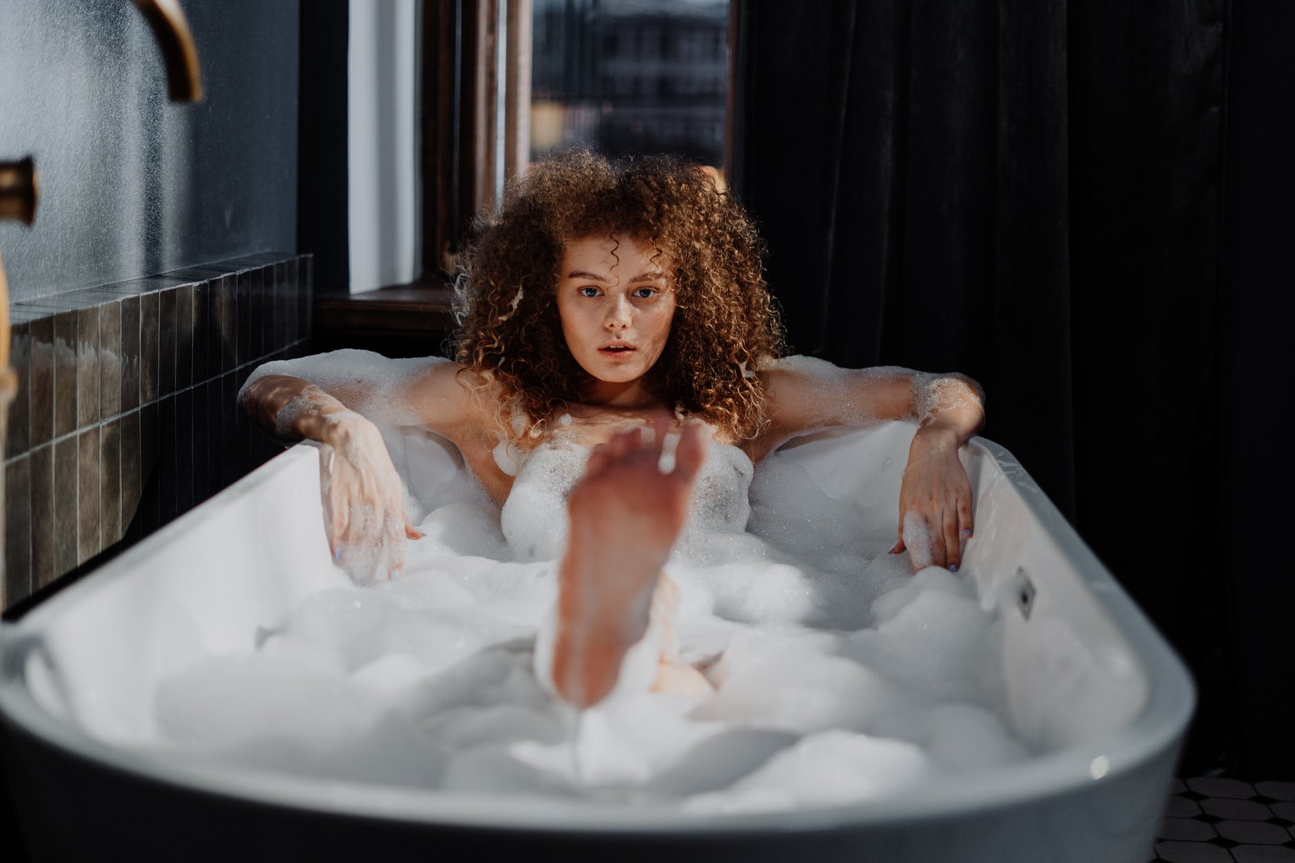 woman in a bubble bath